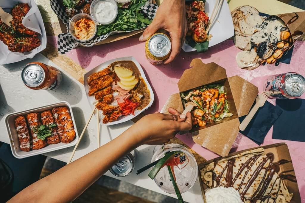 Shared restaurant meal representing a branded guest experience