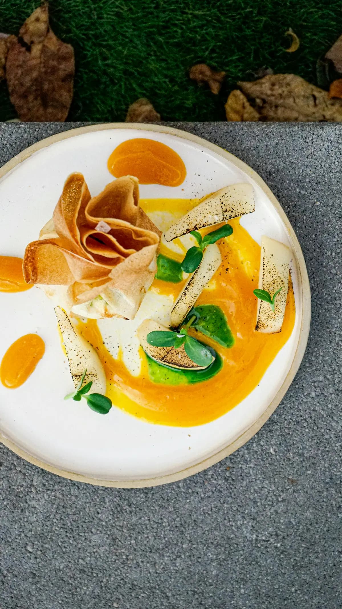 A plated dish arranged on a restaurant table
