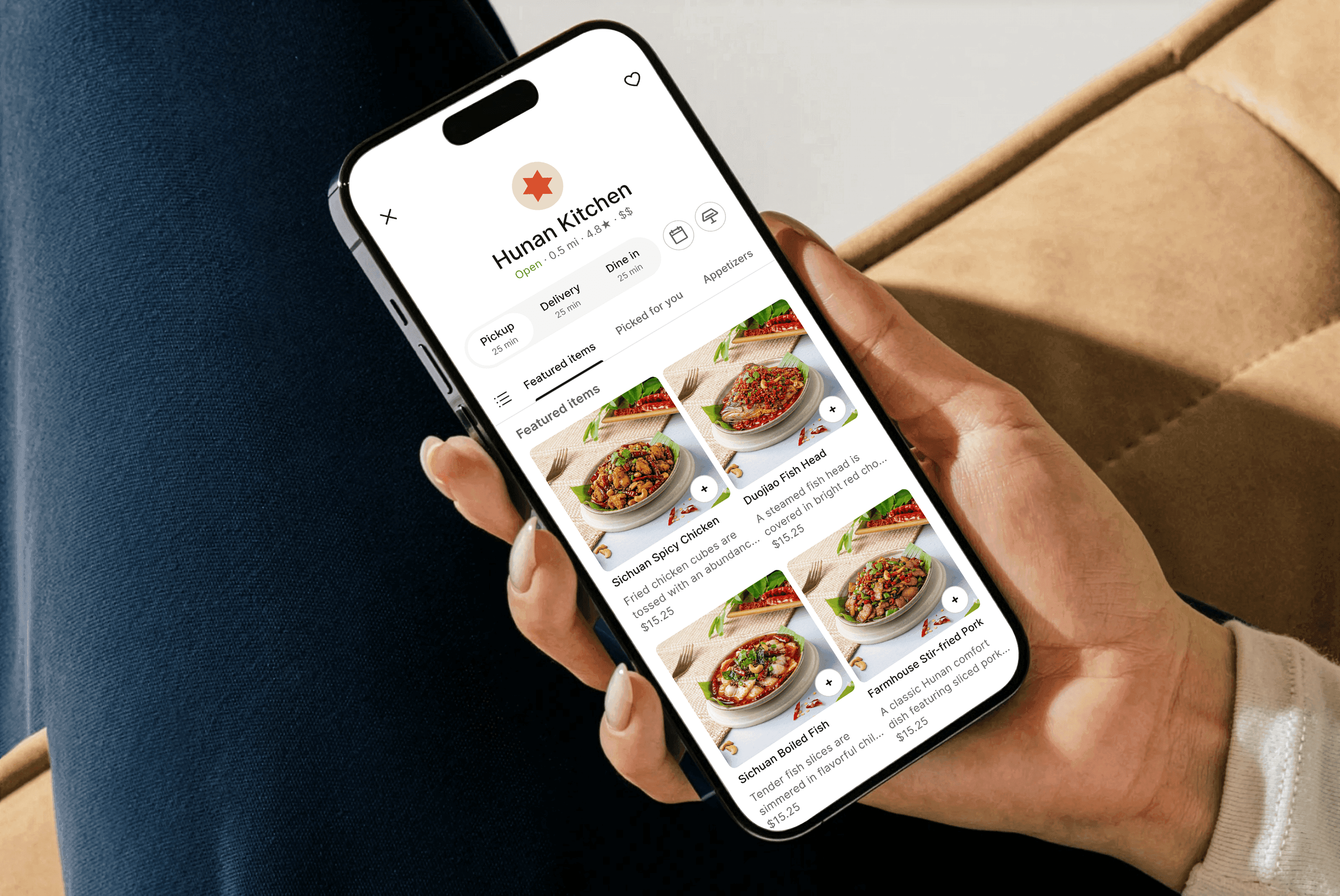 Peblla branded restaurant app displayed on a phone beside a restaurant meal