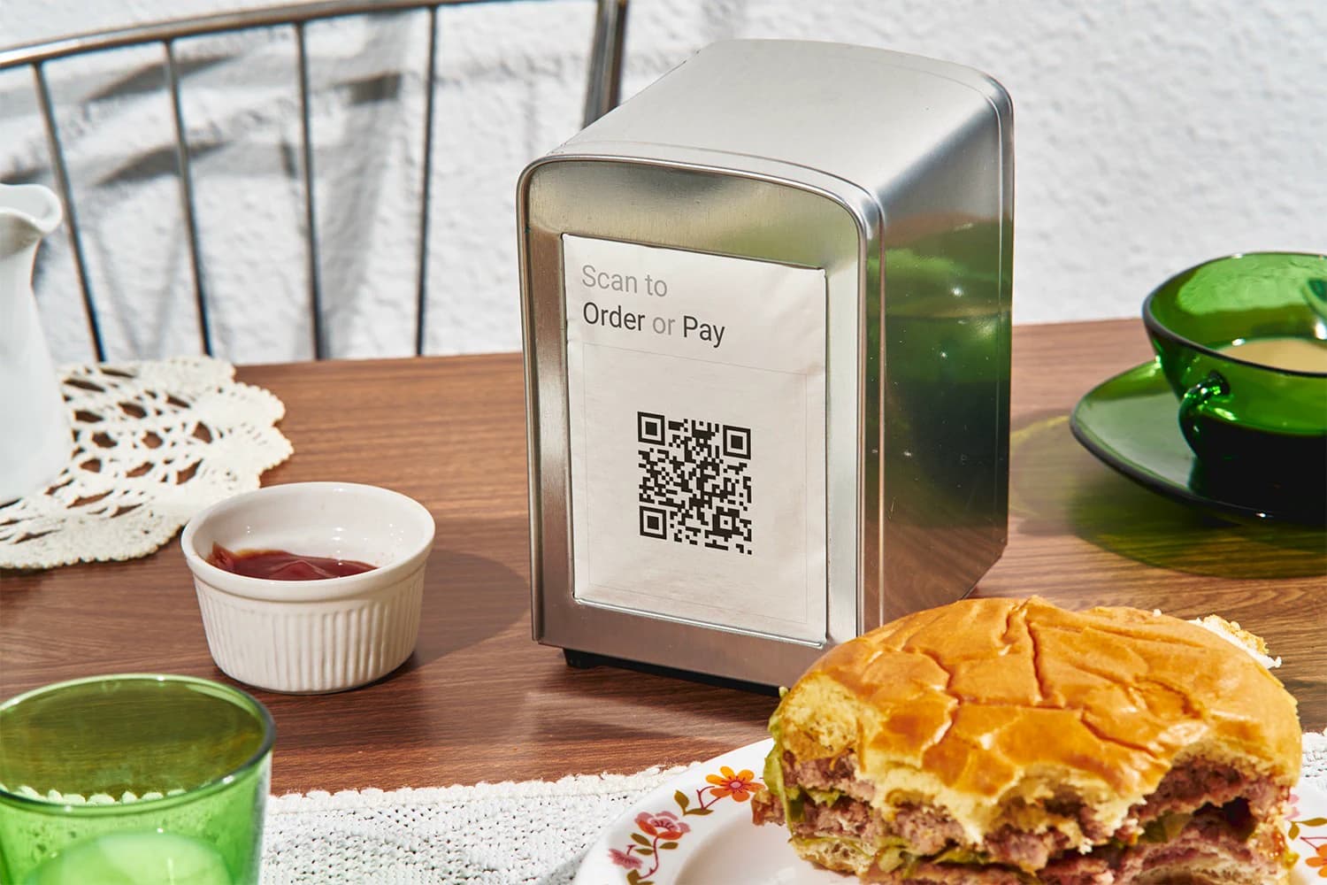 Restaurant table offering QR ordering and payment